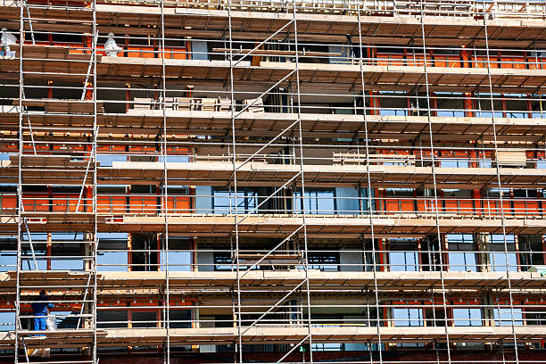 istock Scaffolding against a new apartment building 2225588895