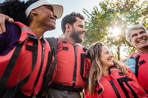istock Happy friends embracing before aquatic sport 2225588912