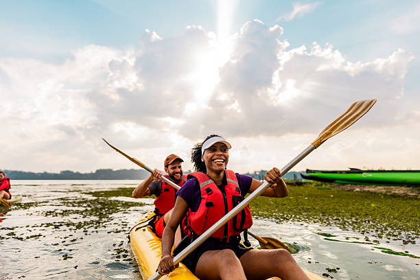 istock Couple kayaking in a lake 2225589598