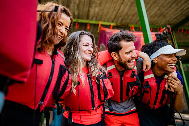 istock Happy friends embracing before aquatic sport 2225592008