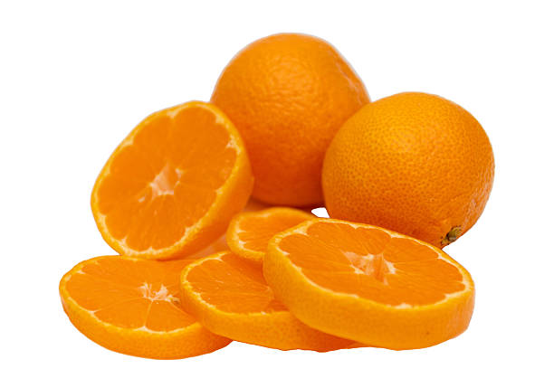 Whole oranges and fresh slices arranged on a clean white background. Bright and vibrant citrus fruits, ideal for food, health, and wellness themes.