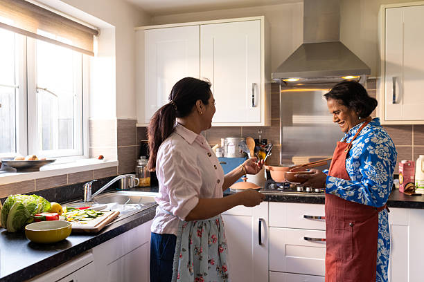 istock Happy Moments Cooking Together at Home 2225593651