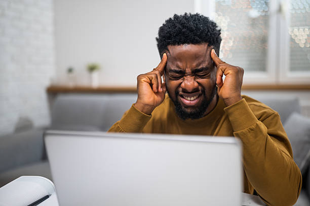 istock African freelancer under physical and emotional pressure at home workspace 2225594372