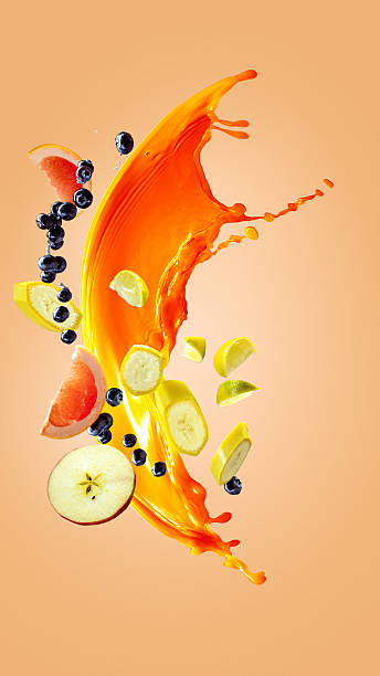istock Hand made collage. Fruit splash with banana, apple, grapefruit and blueberry on orange background 2225595056