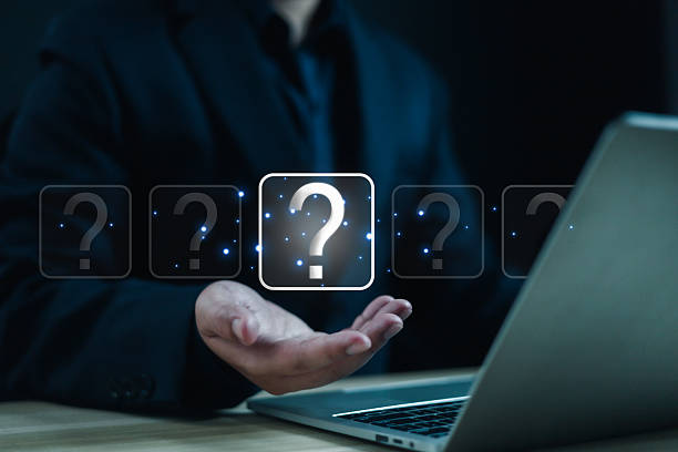 istock Question mark shows on a palm, Businessman show question mark icon, Technology question concept, FAQ, Wondering questioning and problem-solving, Q and A, ask 2225596071