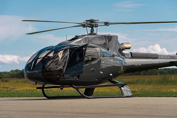 istock Black Turbofan Helicopter with Open Door on Tarmac 2225601832