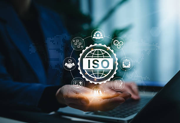 istock ISO Certification and Quality Assurance Compliance Concept. Person holds ISO certification icons representing global standards, compliance, quality management, and organizational processes. certified, 2225606885