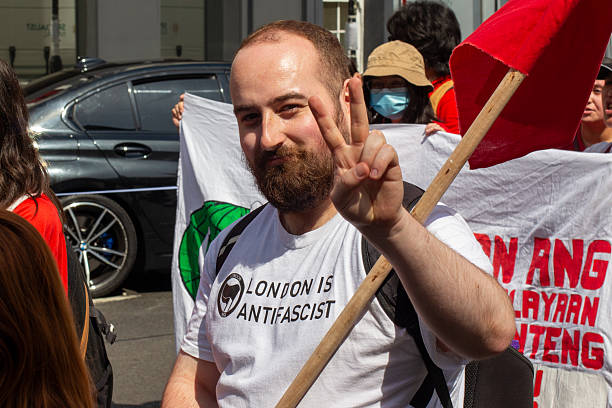 Frankfurt, Germany - June 1, 2013: Protestors and anti-riot police standing face to face at Blockupy 2013 demonstration in the city center of Frankfurt. Blockupy is a left-wing political network of several organizations. The name derives from its plan for a \