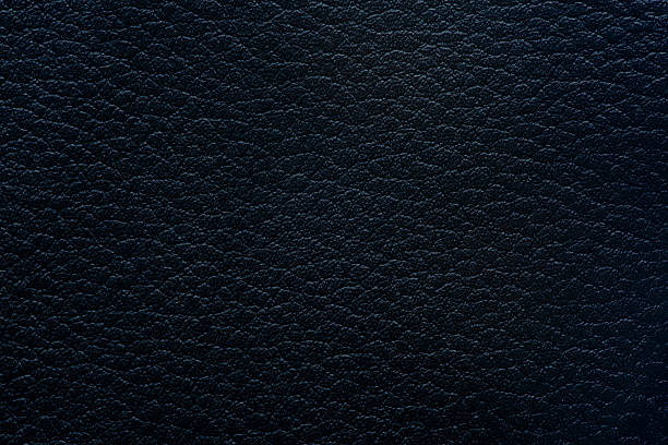 istock Macro synthetic leather surface,black leather texture background, faux leather pattern. 2225609227