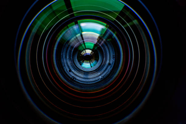 istock Macro camera lens,The diaphragm of old camera lens aperture with warm light bokeh. Selective focus with shallow depth of field. Vintage color tone filtered. Abstract texture background. 2225609296