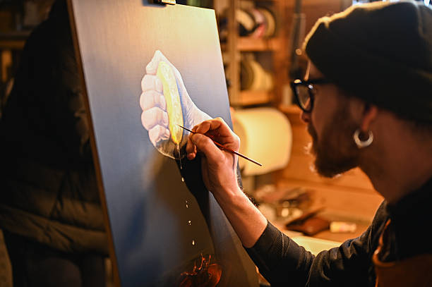 istock Artist painting a lemon on canvas in art studio 2225613418