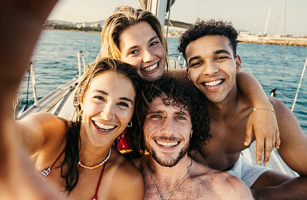 istock Happy friends taking a selfie on a sailboat 2225613656