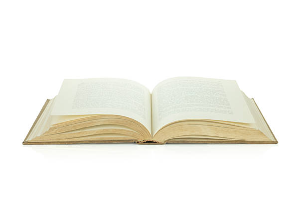 istock Open old vintage book representing knowledge, education, and storytelling. A classic novel or bible for study, research, or learning history and wisdom. isolated on white background with clipping path. 2225615935