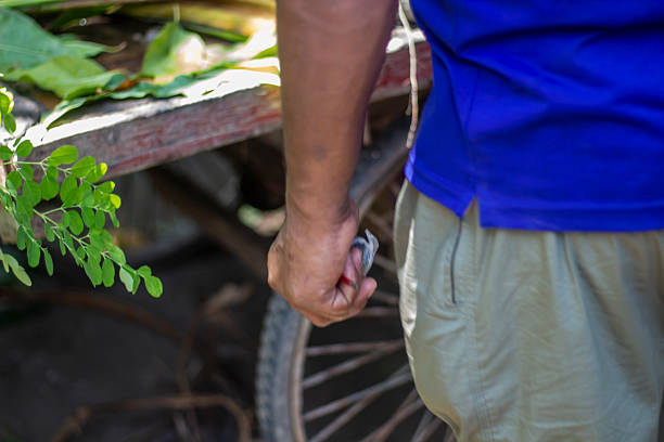 A man showing his hand behind
