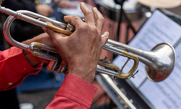 istock Hands in Harmony: The Trumpet’s Voice 2225620754