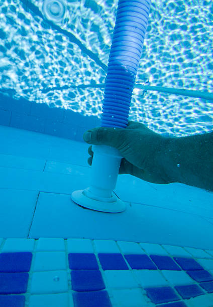istock Connecting suction hose to the vacuum nozzle 2225620995