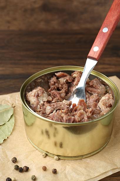 istock Canned meat in tin can on table, closeup 2225621967