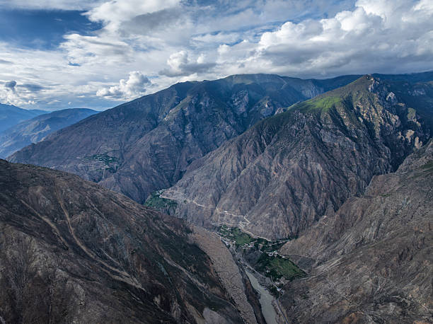 istock Aerial View of a River Encircling a Mountain 2225623093