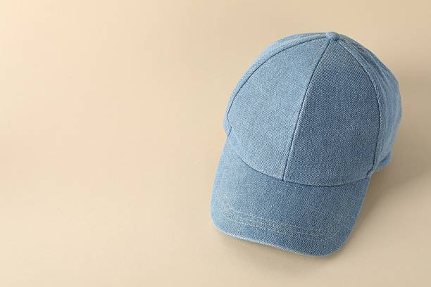 istock Stylish denim baseball cap on beige background. Mockup for design 2225632530