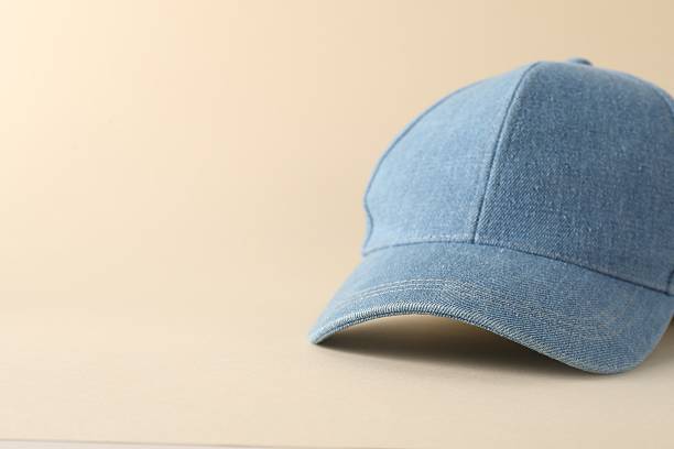 istock Stylish denim baseball cap on beige background, closeup. Mockup for design 2225632621
