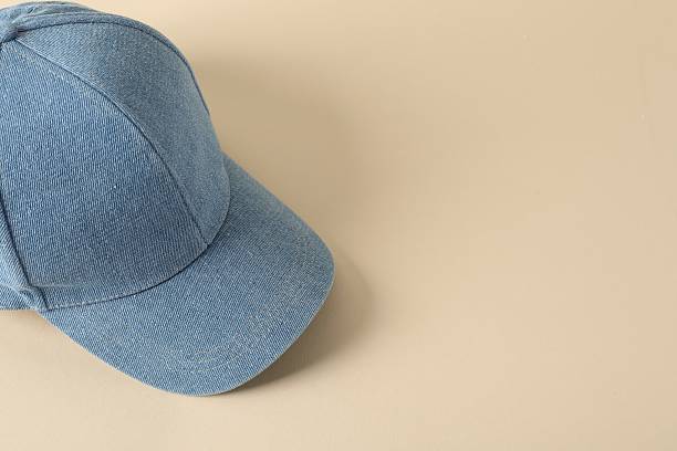 istock Stylish denim baseball cap on beige background. Mockup for design 2225632625