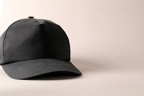 istock Stylish black baseball cap on light grey background. Mockup for design 2225632653