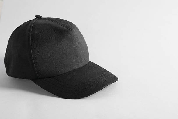 istock Stylish black baseball cap on light grey background. Mockup for design 2225632685