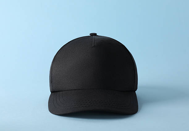 istock Stylish black baseball cap on light blue background. Mockup for design 2225632708