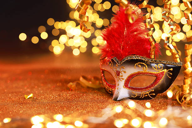 istock Beautiful carnival mask on shiny color background, bokeh effect. Space for text 2225633094