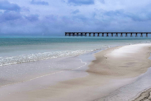 istock Historic Ice & Snow Transforms Navarre, Florida Coastal Pier – Once in a Lifetime Winter Beach 2225633251