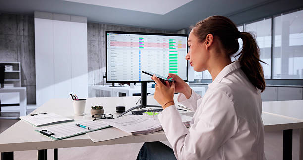istock Female Doctor Scans Medical Invoice 2225634496