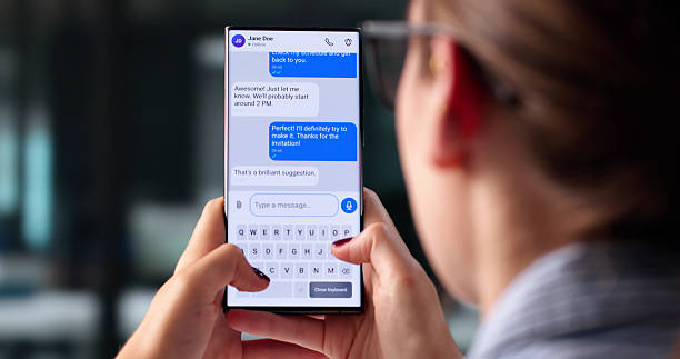 istock Messaging App: Young Woman Holding Phone, Sending Text 2225635838