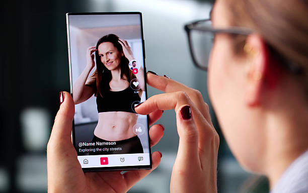 istock Browsing News Articles On Smartphone While Swiping Through Social Media 2225635853