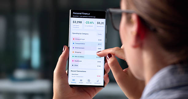 istock Smartphone Budgeting App: A Financial Accountant Planning Woman's Future 2225635856