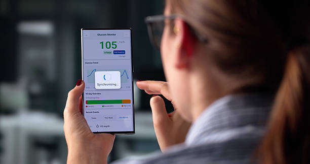 istock Female Healthcare Worker Uses Smart Sensor 2225635886