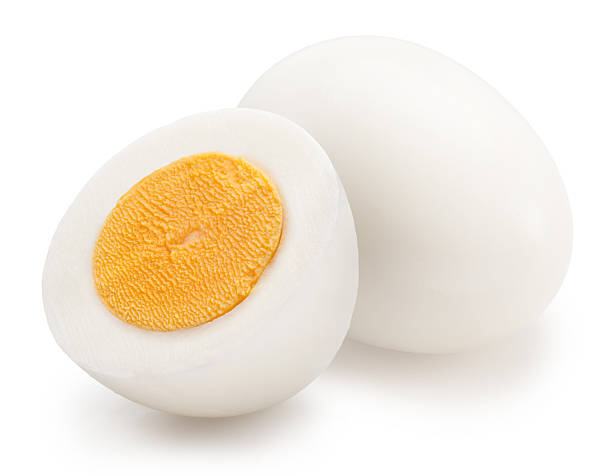 istock Hard-boiled chicken egg and half of egg with yellow hard yolk on white background. File contains clipping path. 2225638443