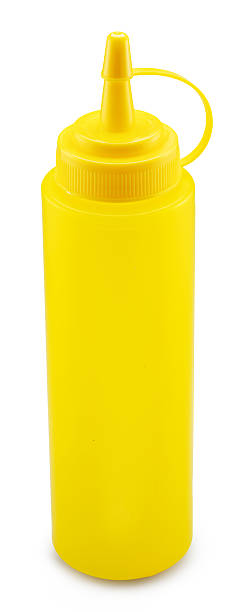 istock Yellow plastic dispenser bottle for mustard or other sauce isolated on white background. File contains clipping path. 2225638598