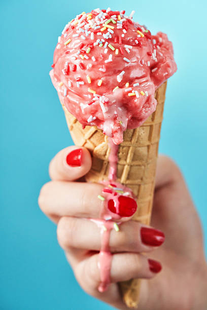 Strawberry Ice Cream with Sprinkles in a Cone