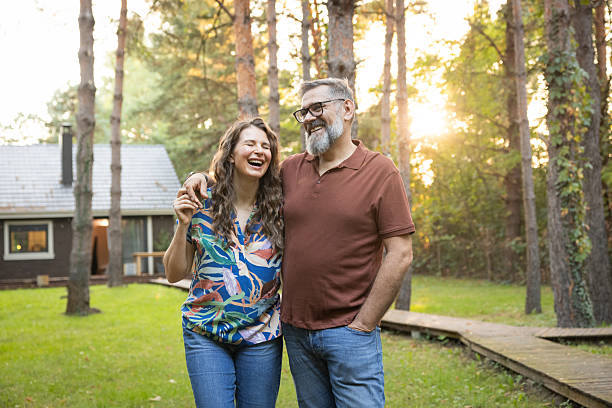 istock Embraced mature couple taking a walk in the backyard 2225645861