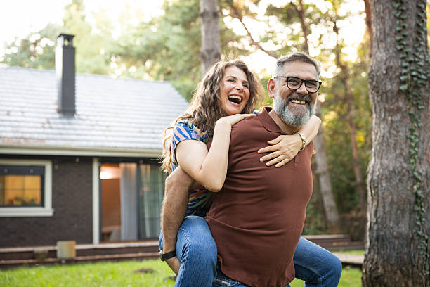 istock Embraced mature couple taking a walk in the backyard 2225645888