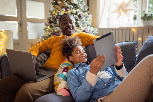 istock Father and daughter spending Christmas together 2225648960