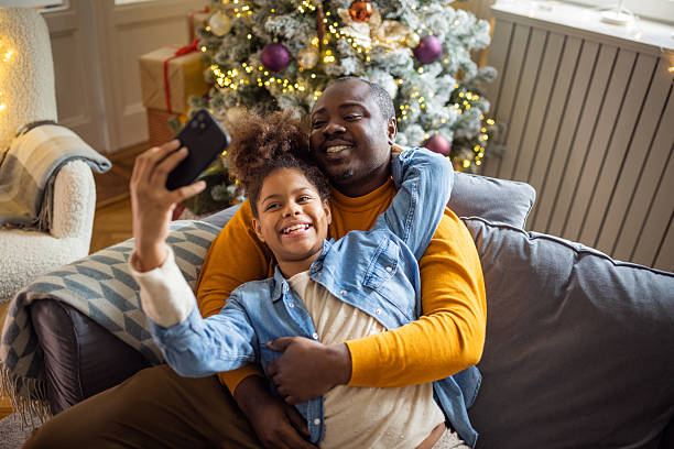 istock Father and daughter spending Christmas together 2225648996