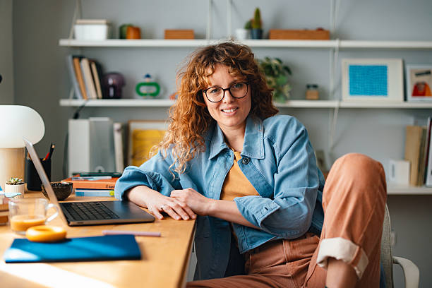 istock Woman Working in Comfortable Home Office with Laptop and Relaxed Atmosphere 2225649044