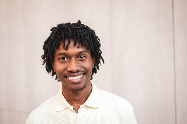 istock Young african american man smiling and looking at camera 2225649871
