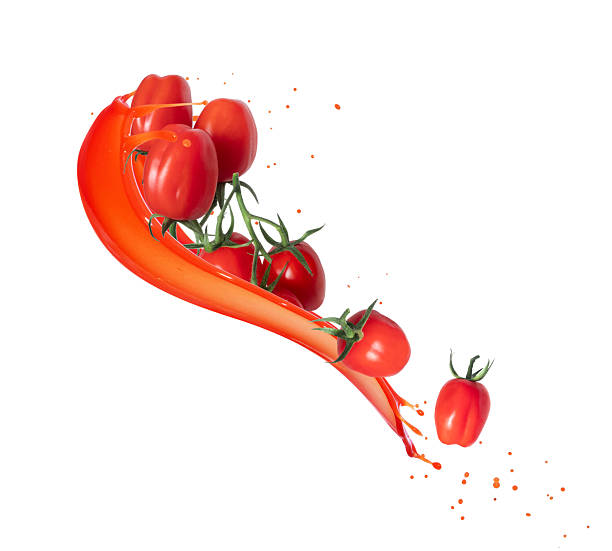 istock Ripe cherry tomatoes in juice splashes isolated on white background 2225650001