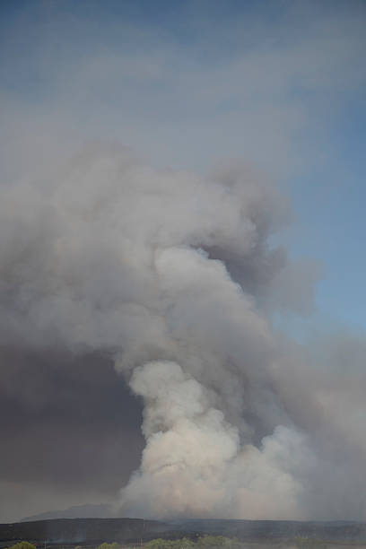 Dark and Thick Smoke from a California Brush Fire fills the sky.