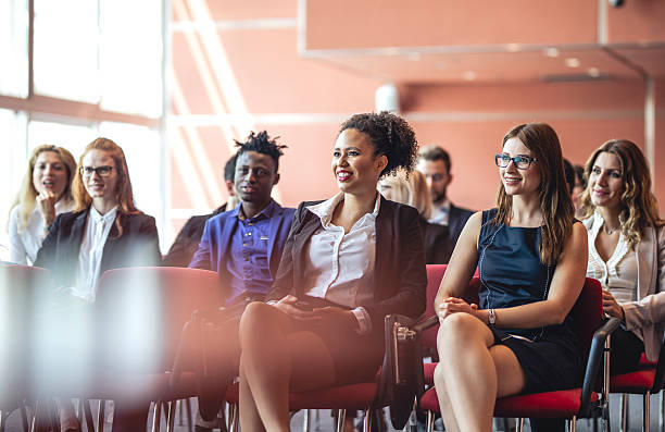 istock Engaged Business Executives Attending Conference in Modern Venue 2225652597