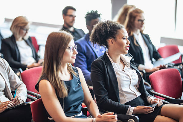 istock Diverse Business Executives Attending Conference with Focused Attention 2225652599