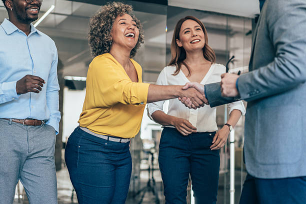 istock Business people shaking hands in the office 2225661719