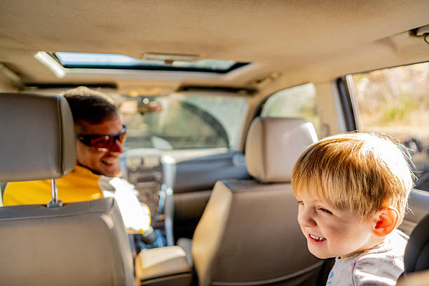 istock Toddler boy talking with father during a long road trip 2225664997